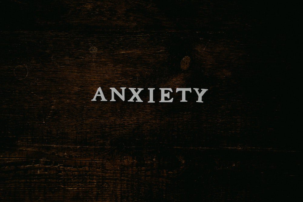 anxiety words on wood